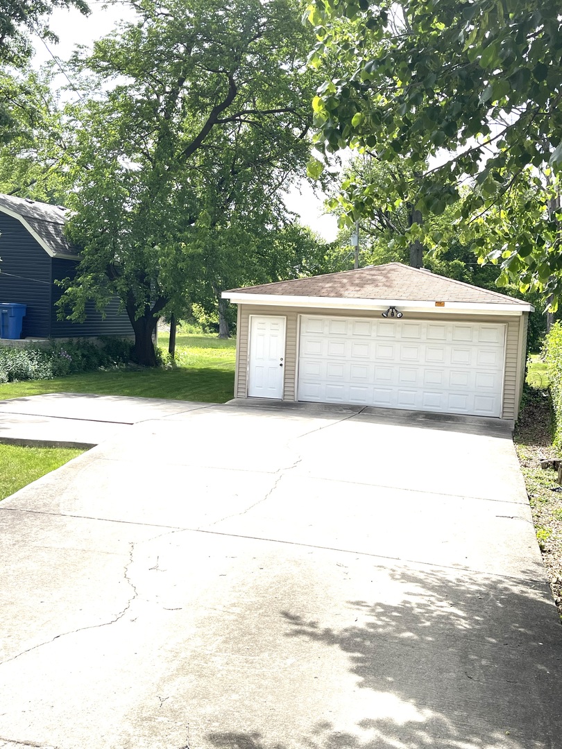 Undisclosed Address Chicago, IL 60643 - Photo 3 of 19 a view of a yard with large trees