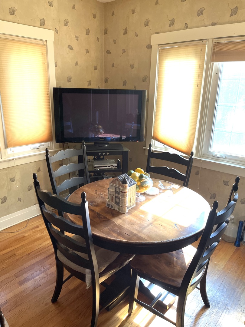 Undisclosed Address Chicago, IL 60643 - Photo 9 of 19 a view of a dining room with furniture and a window
