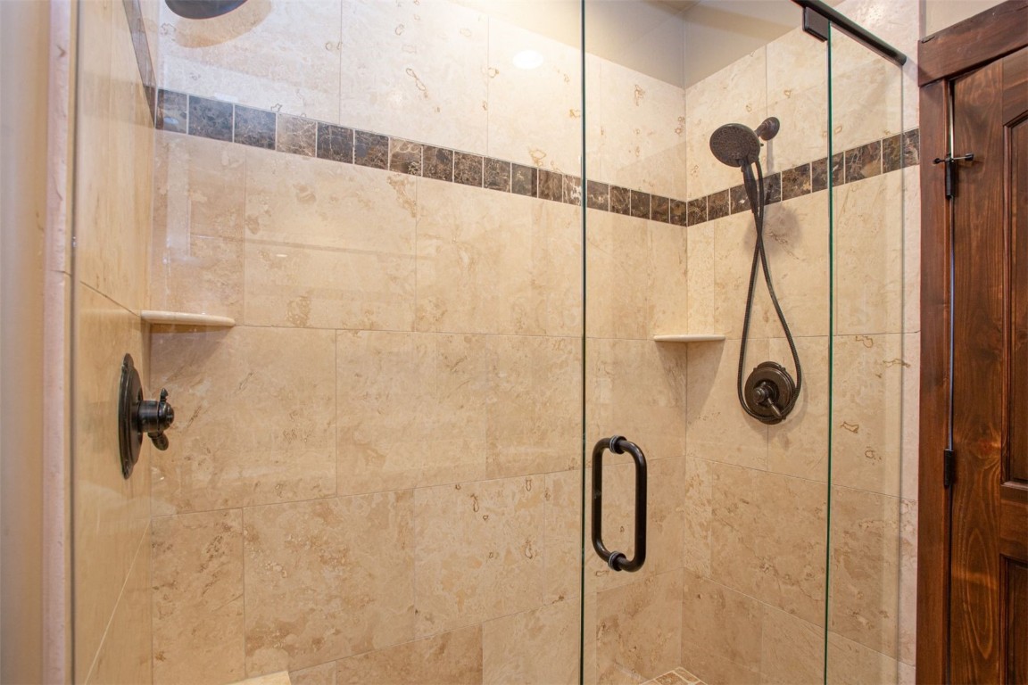 421 Rainbow Drive, Unit 5 Silverthorne, CO 80498 - Photo 24 of 36 a bathroom with a shower