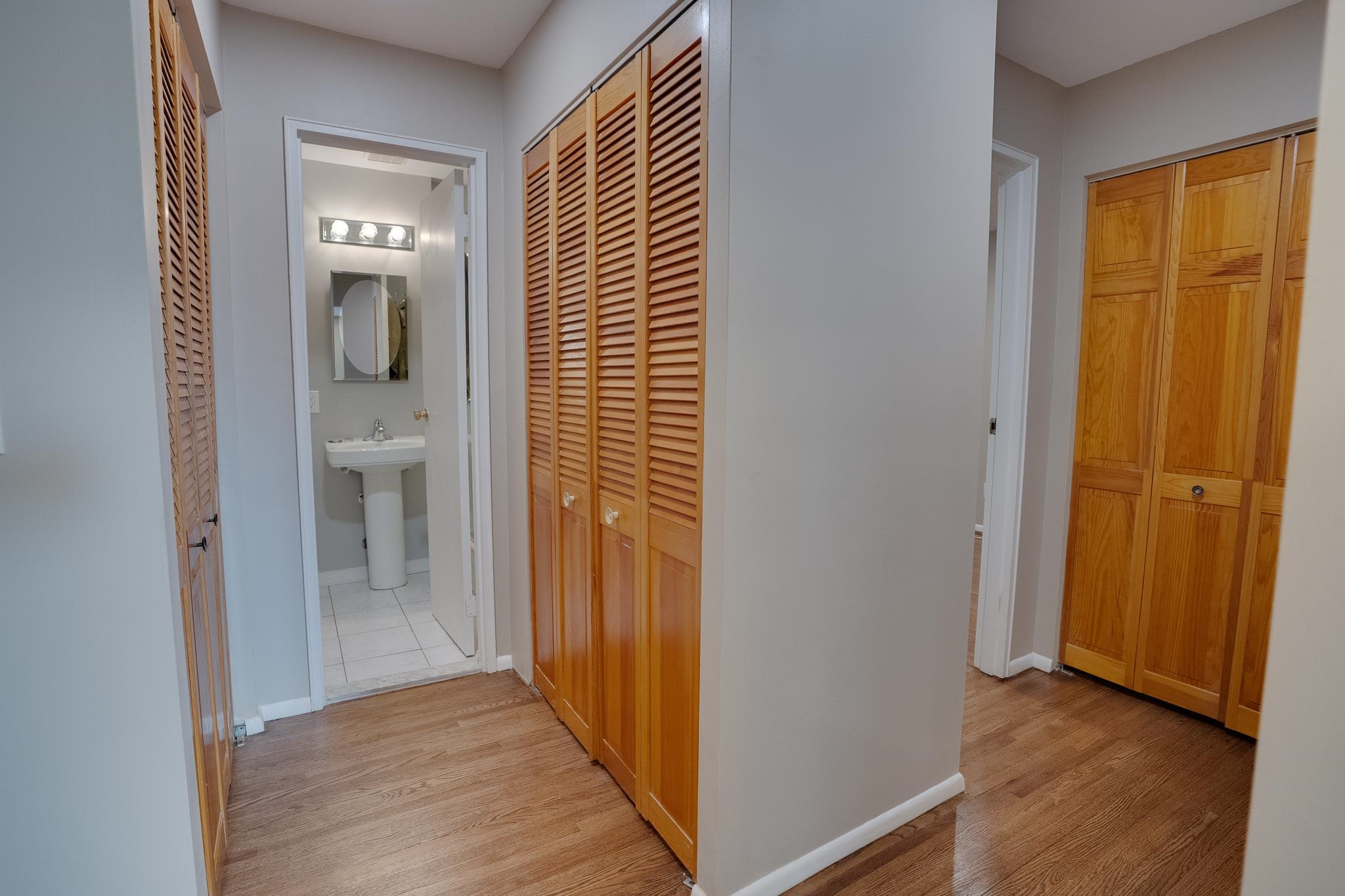 1138F Farm Road, Unit D Secaucus, NJ 07094 - Photo 6 of 10 a view of a bathroom from a hallway