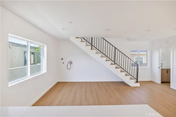 a view interior of a house with wooden floor windows and stairs