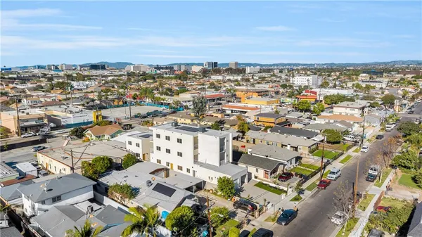 an aerial view of a city with lots of residential buildings