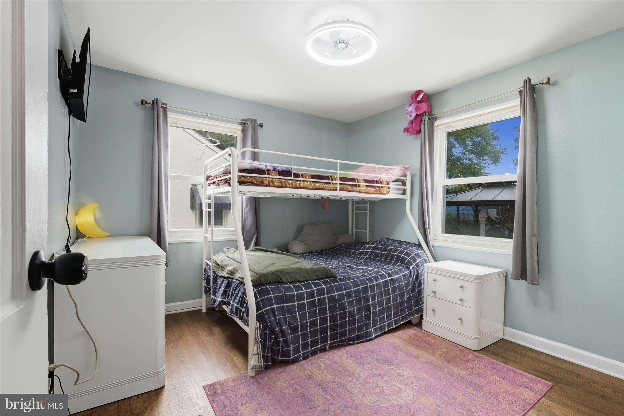 5024 Addison Road Capitol Heights, MD 20743 - Photo 16 of 23 a bedroom with a bed and a window