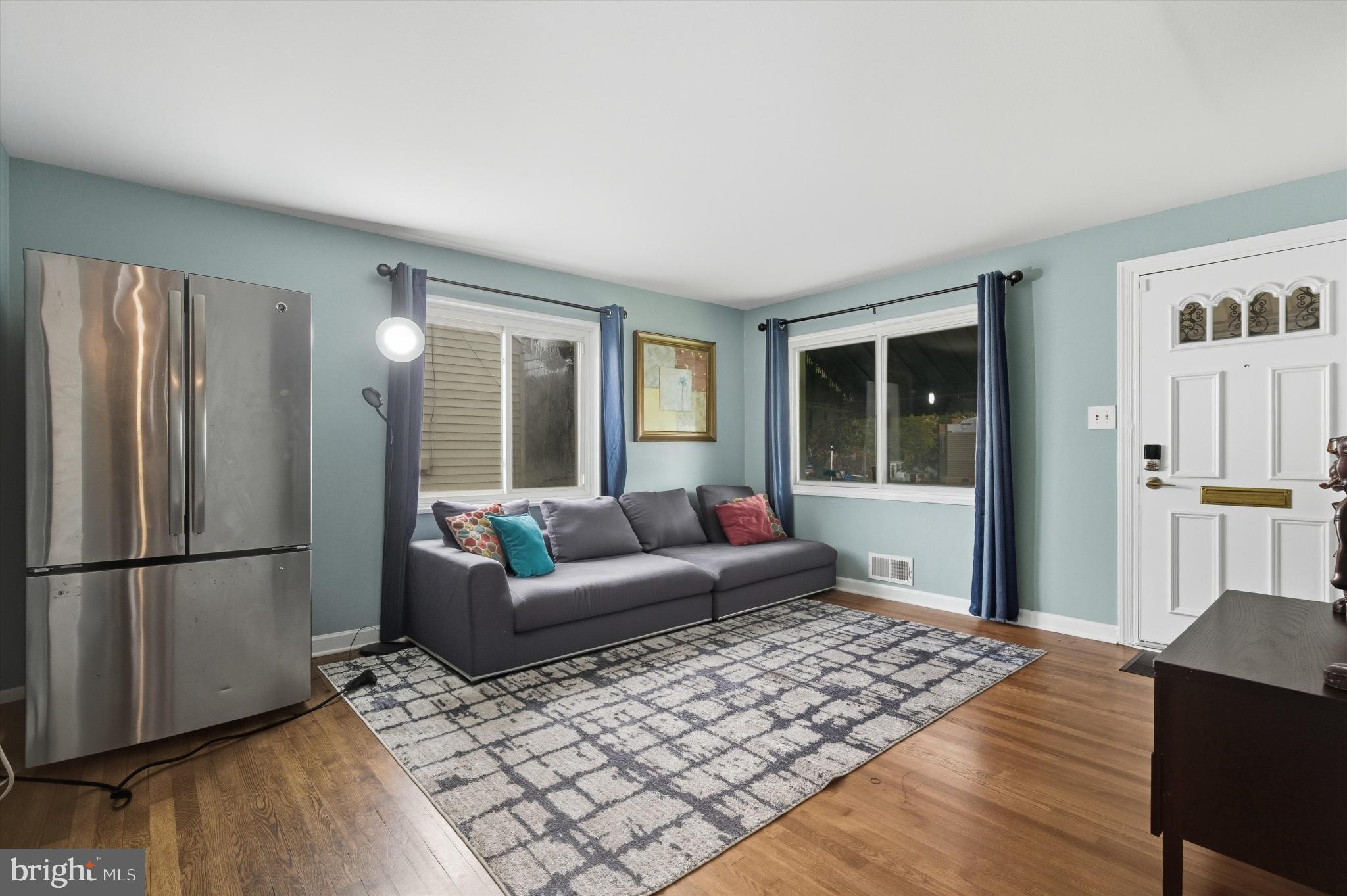 5024 Addison Road Capitol Heights, MD 20743 - Photo 5 of 23 a living room with furniture and a window