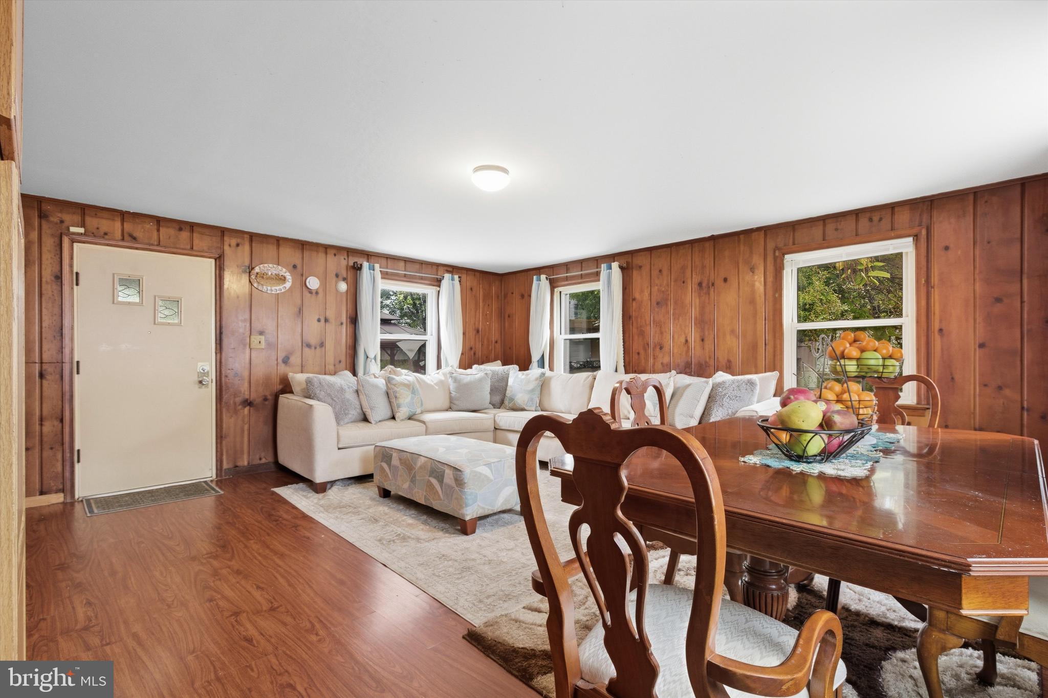 5024 Addison Road Capitol Heights, MD 20743 - Photo 10 of 23 a living room with furniture and a large window