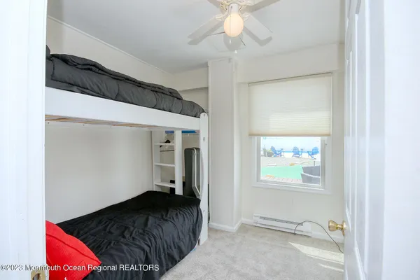 a view of a livingroom with washer and dryer