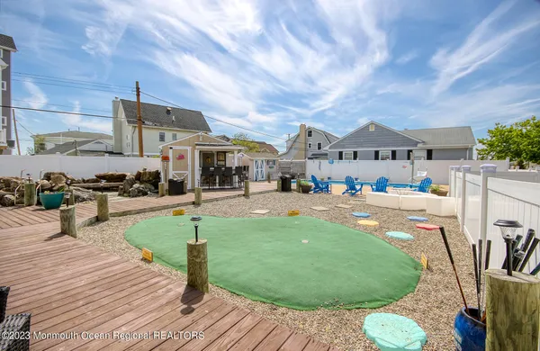 a view of a patio with swimming pool