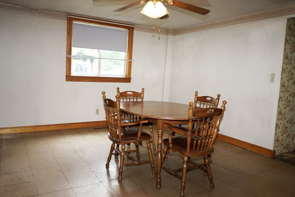 56 Lombard Road Hubbardston, MA 01452 - Photo 14 of 29 a view of a dining room with furniture and window