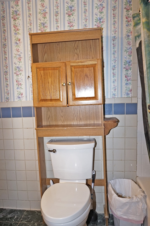 56 Lombard Road Hubbardston, MA 01452 - Photo 20 of 29 a bathroom with a toilet a sink and a shower