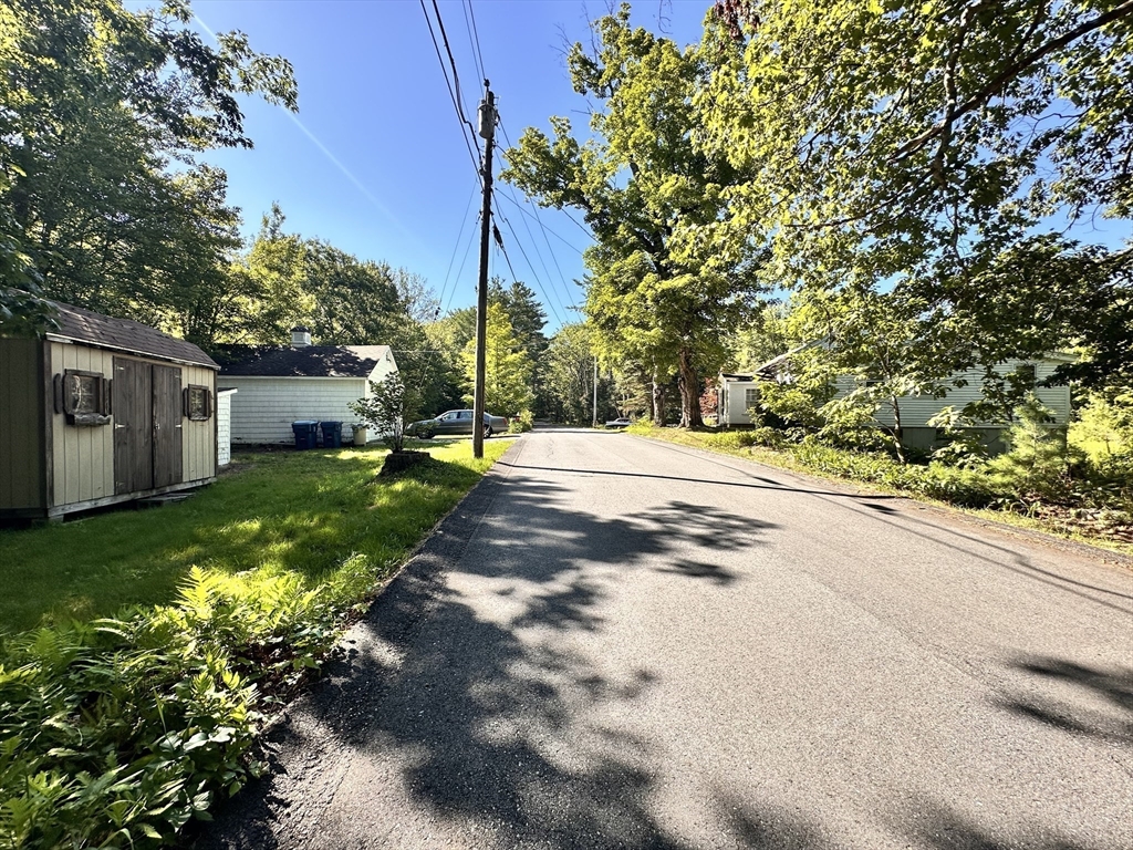 56 Lombard Road Hubbardston, MA 01452 - Photo 24 of 29 a view of a house with backyard and tree