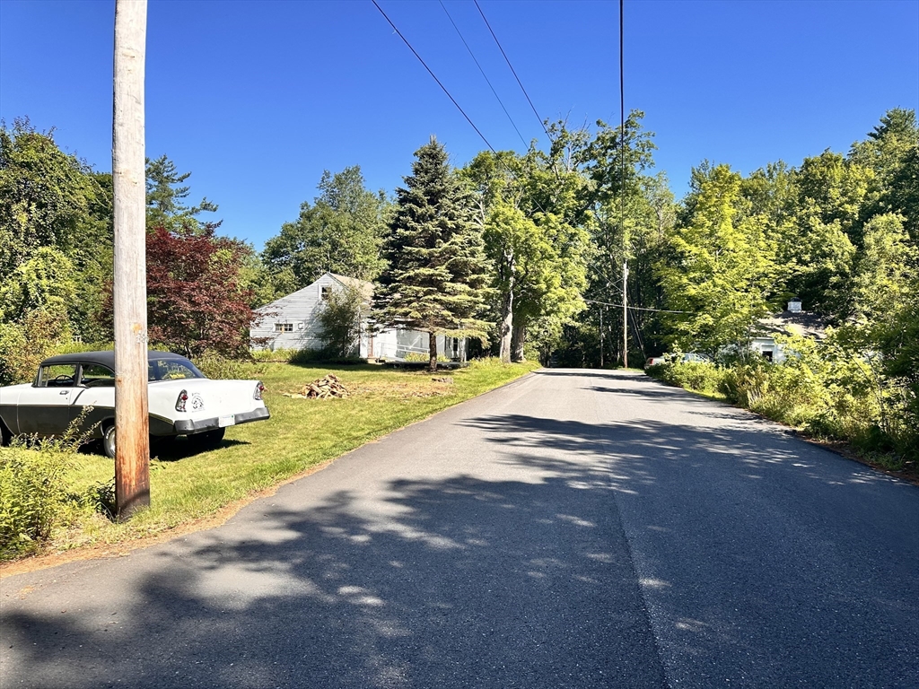 56 Lombard Road Hubbardston, MA 01452 - Photo 25 of 29 a view of a house with a yard