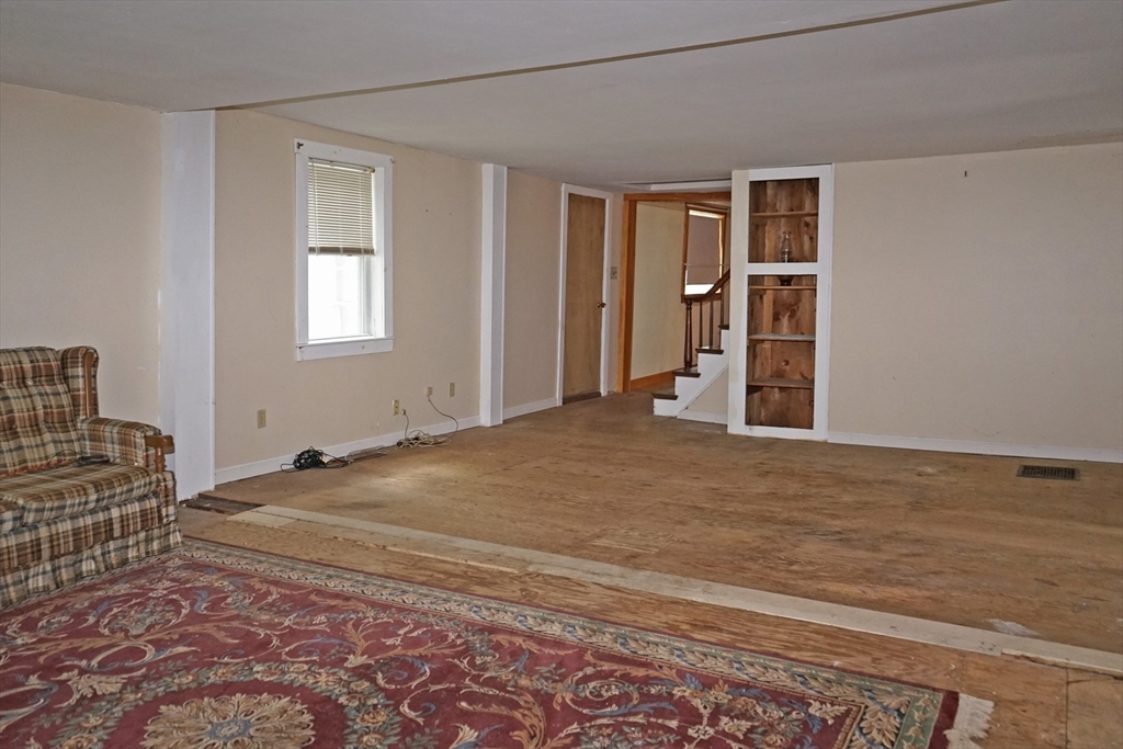 56 Lombard Road Hubbardston, MA 01452 - Photo 6 of 29 a bedroom with a bed and a window