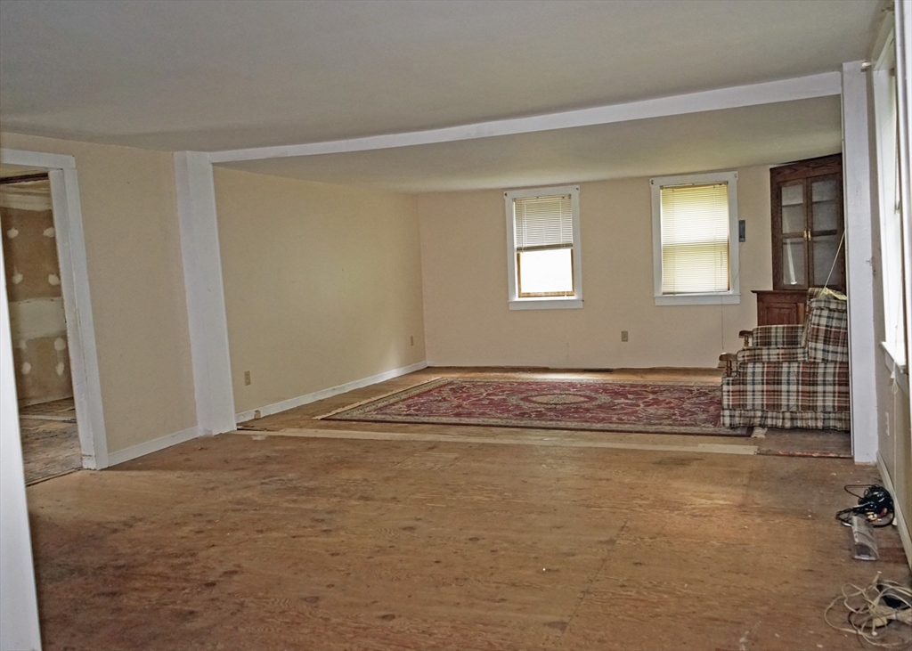 56 Lombard Road Hubbardston, MA 01452 - Photo 7 of 29 a view of an empty room with a window