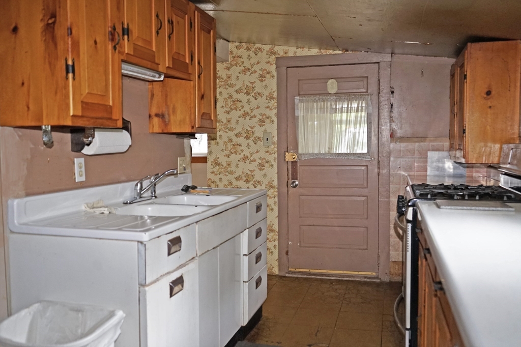 56 Lombard Road Hubbardston, MA 01452 - Photo 9 of 29 a bathroom with a sink and a mirror