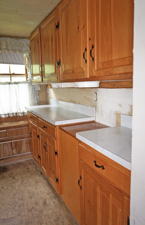 56 Lombard Road Hubbardston, MA 01452 - Photo 10 of 29 a kitchen with stainless steel appliances a cabinets and a sink
