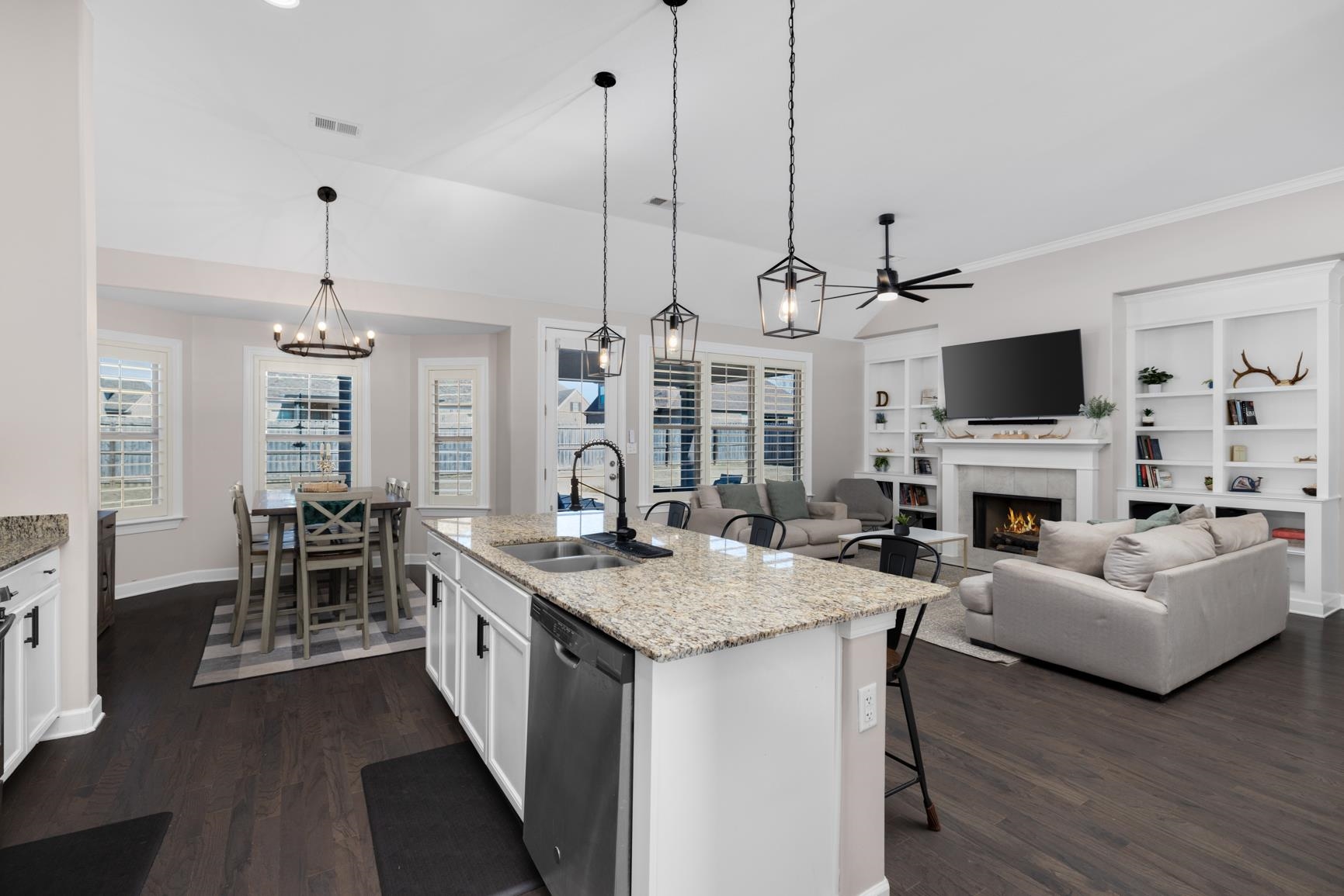 235 Misty Fields Road Oakland, TN 38060 - Photo 18 of 40 a kitchen with sink stove and living room