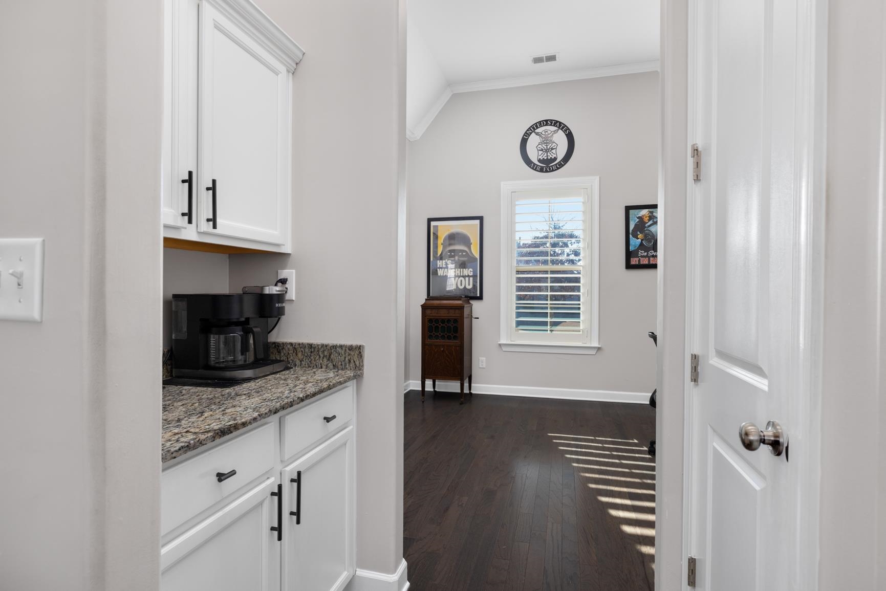 235 Misty Fields Road Oakland, TN 38060 - Photo 19 of 40 a view of washer and dryer with wooden floor