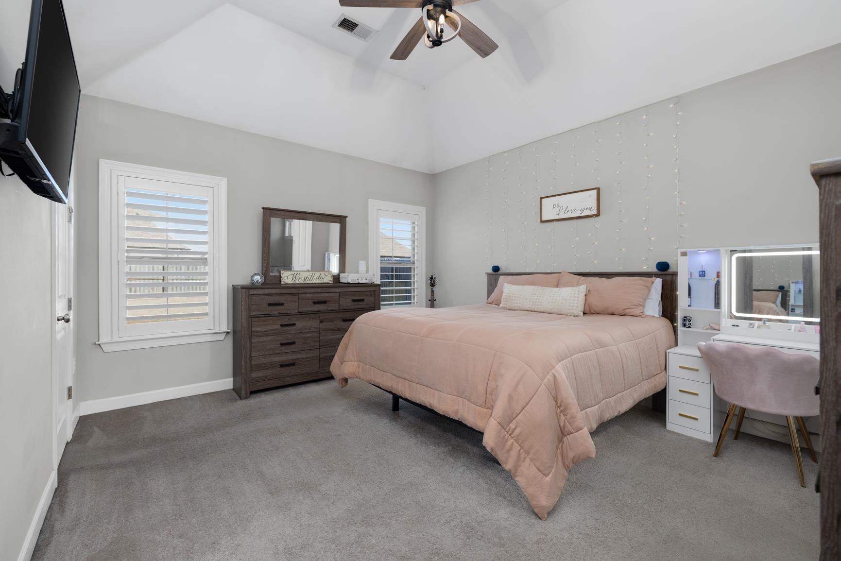 235 Misty Fields Road Oakland, TN 38060 - Photo 22 of 40 a bedroom with a bed and a television