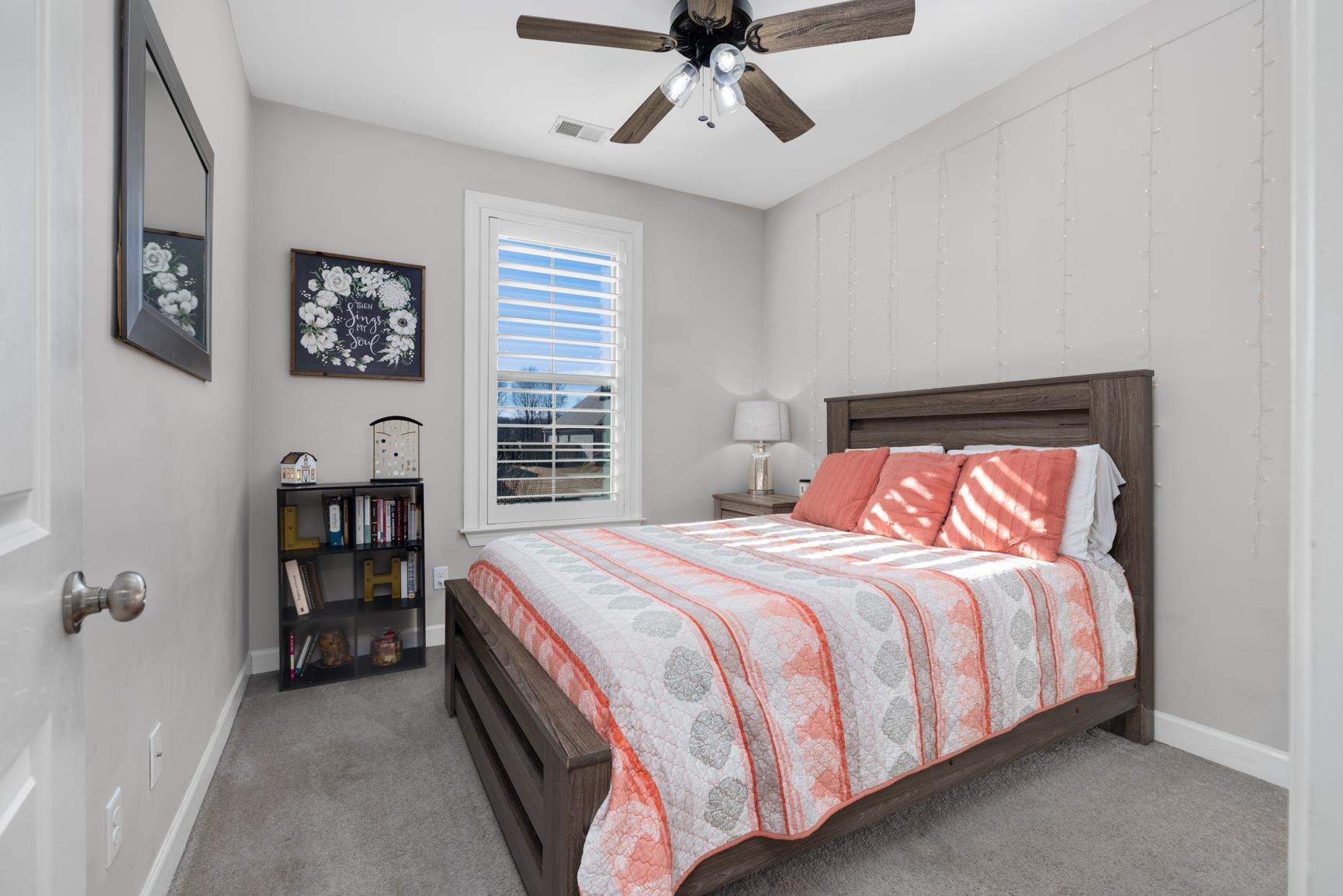 235 Misty Fields Road Oakland, TN 38060 - Photo 29 of 40 a bedroom with a bed and a large window