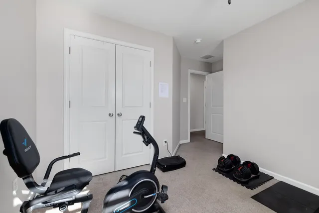 a view of a workspace with gym equipment