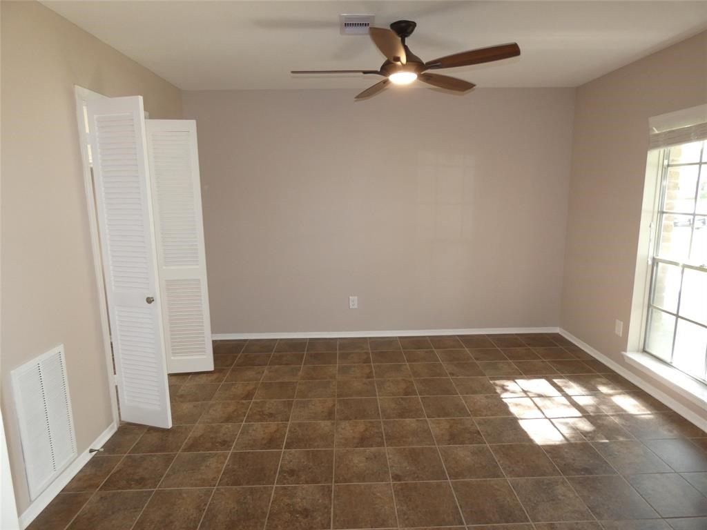 3406 Rockyridge Drive Houston, TX 77063 - Photo 2 of 13 a view of an empty room and window