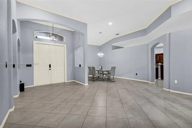 a living room with a couch and a flat screen tv