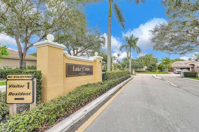 a view of a sign board on the side of a building