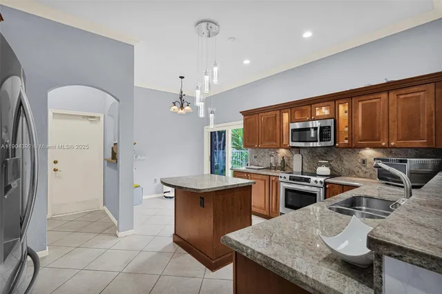 a view of a hallway with staircase