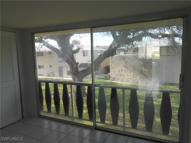 a view of a balcony with an ocean view