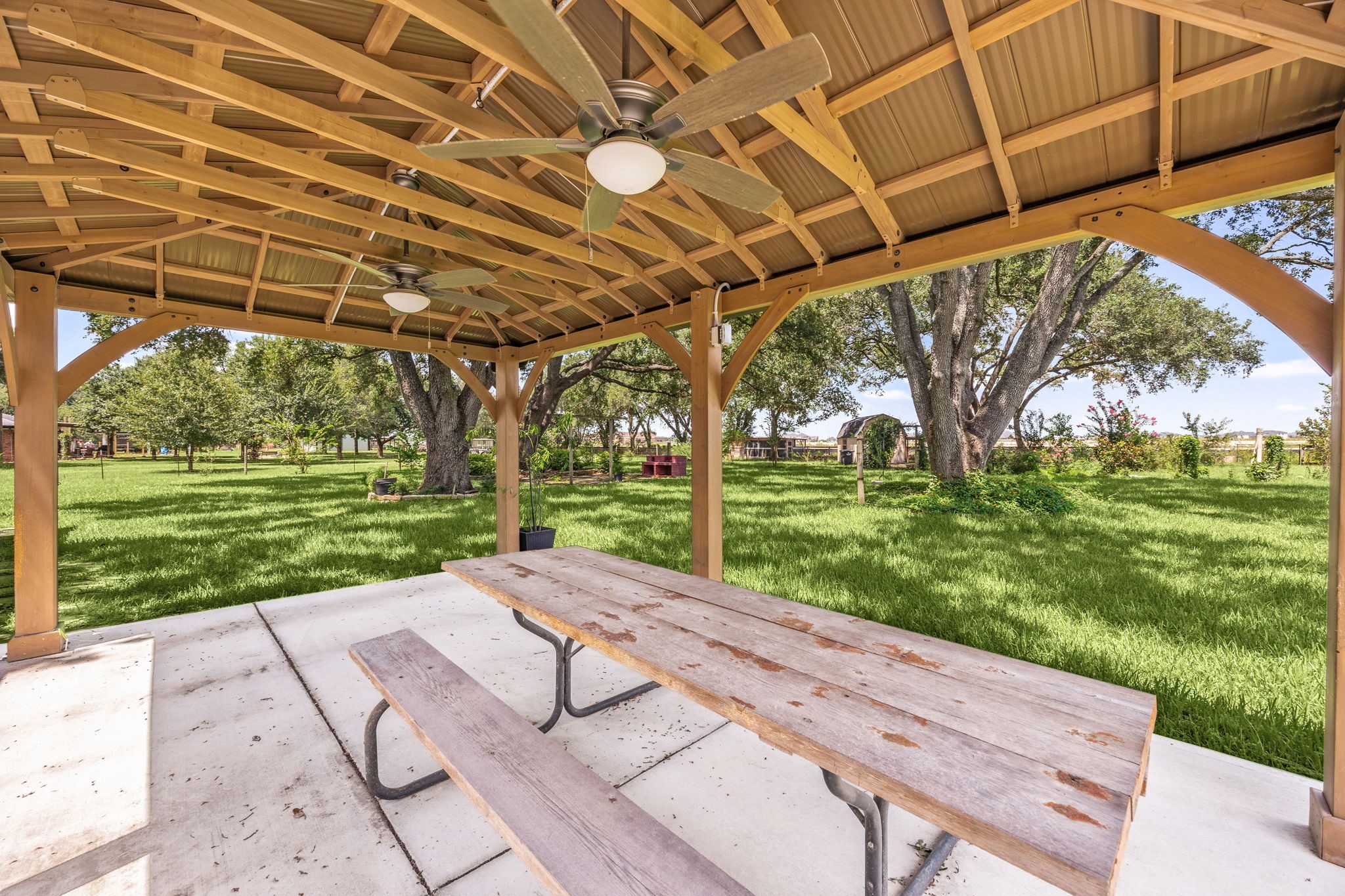 3530 Katy Hockley Road Katy, TX 77493 - Photo 14 of 25 a view of a backyard with wooden floor