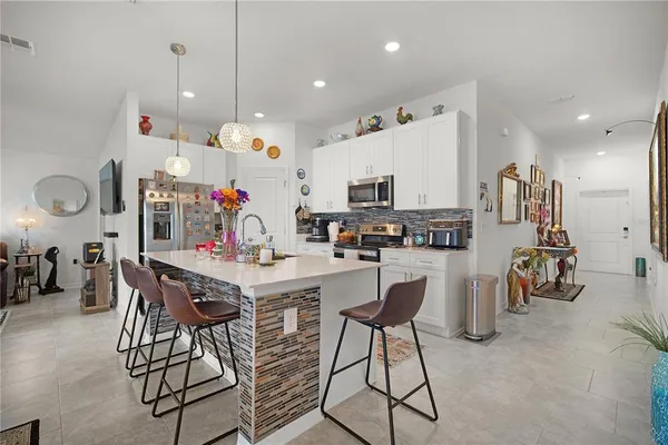 a view of kitchen and windows