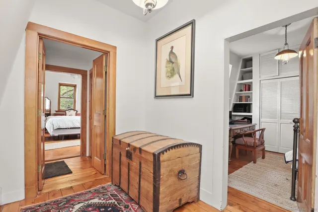 a view of utility room and bedroom