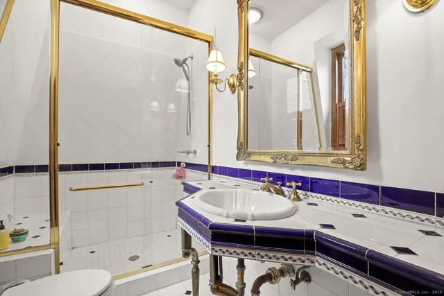 a bathroom with a bathtub and a sink