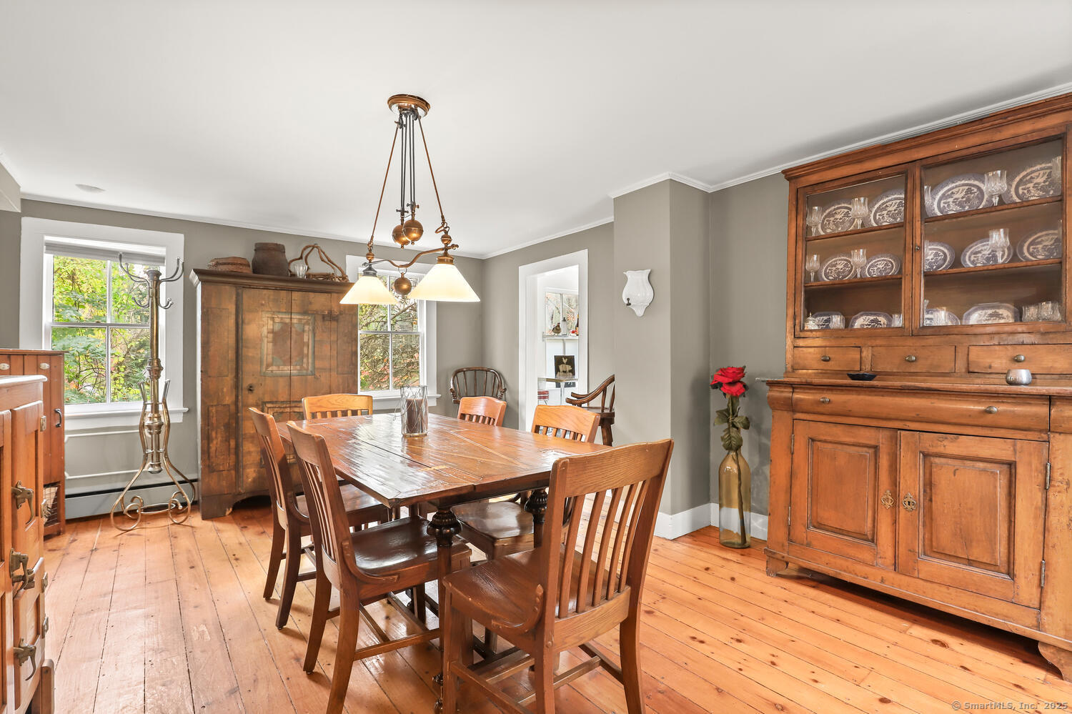 47 Hollow Tree Ridge Road Darien, CT 06820 - Photo 9 of 40 a view of a dining room with furniture window and outside view