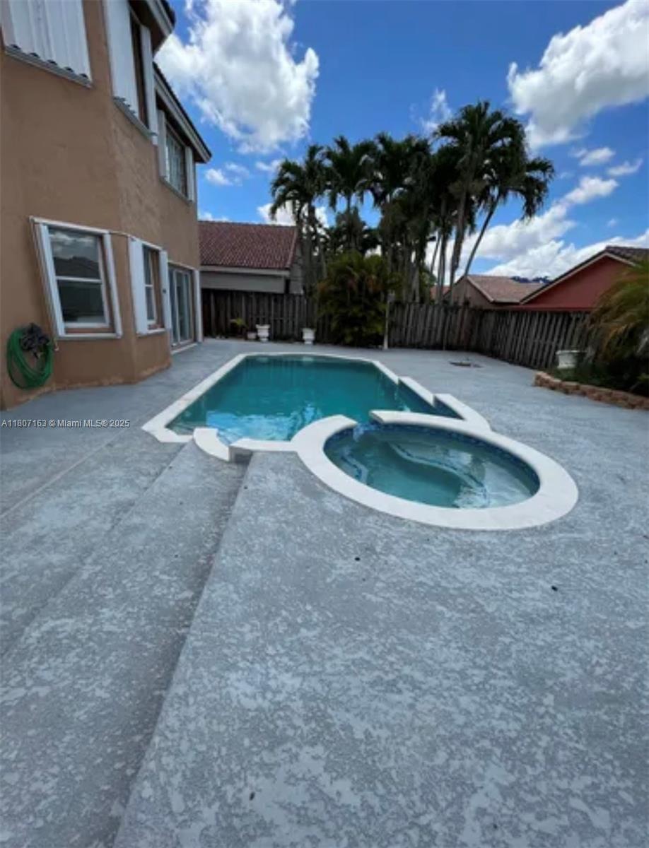 16461 Southwest 100th Terrace Miami, FL 33196 - Photo 16 of 18 a view of outdoor space yard and swimming pool