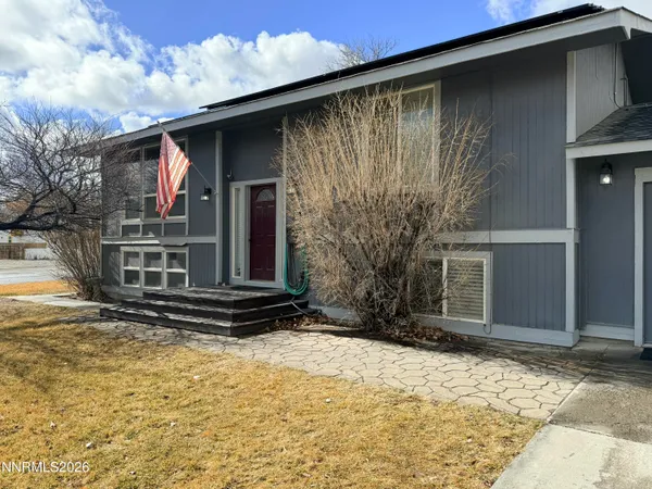 a front view of house with yard