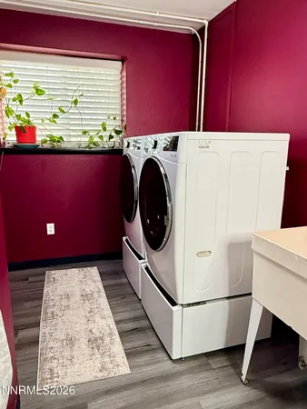 a utility room with dryer and washer