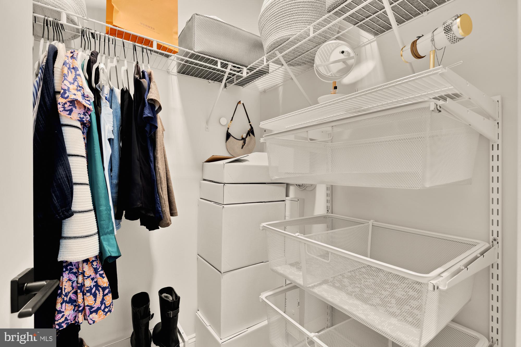 2630 39th Street Northwest, Unit 1 Washington, DC 20007 - Photo 18 of 26 a view of walk in closet with clothes and shoes