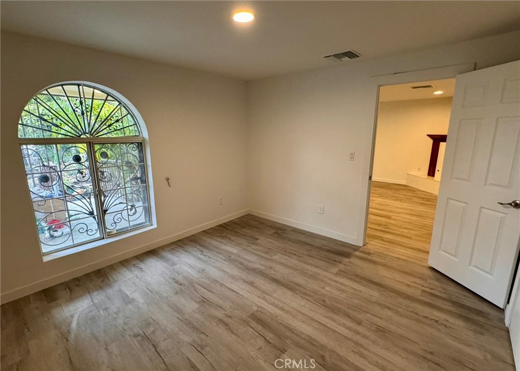 1362 South Downey Road Los Angeles, CA 90023 - Photo 9 of 30 a view of an entryway with wooden floor