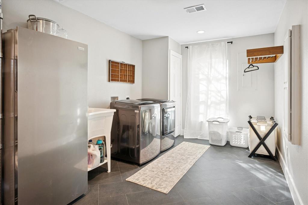 437 South 1st Street Krum, TX 76249 - Photo 27 of 38 a living room with a couch and a window