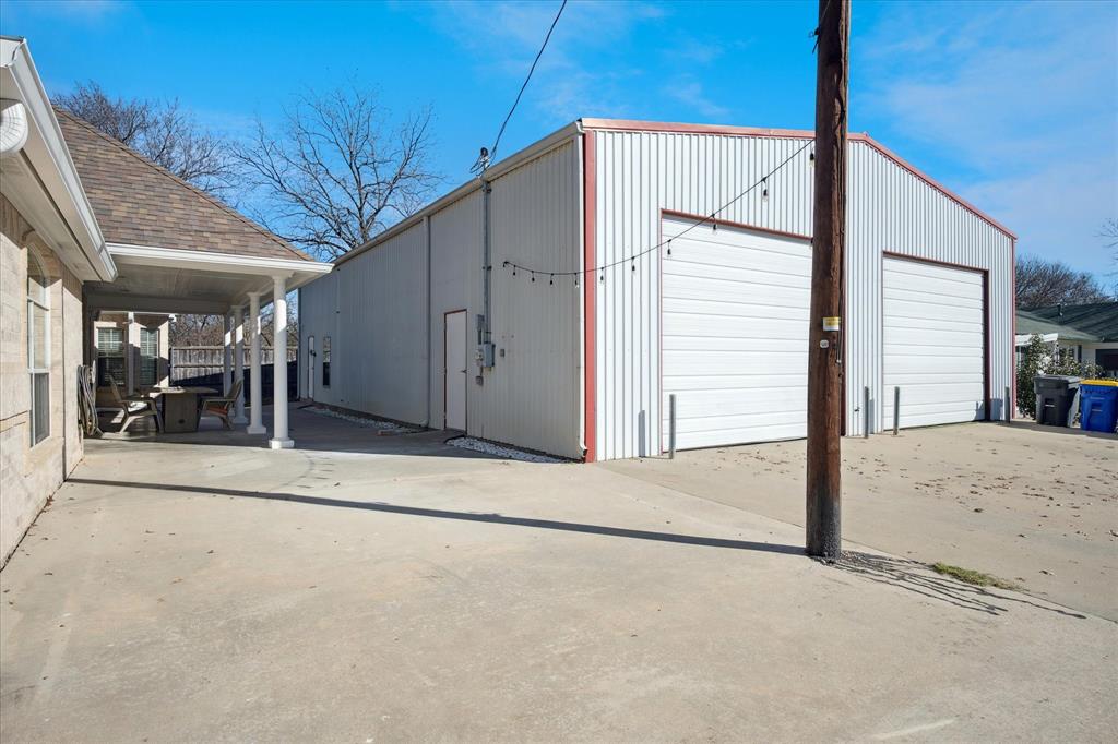 437 South 1st Street Krum, TX 76249 - Photo 28 of 38 a view of a house with a outdoor space