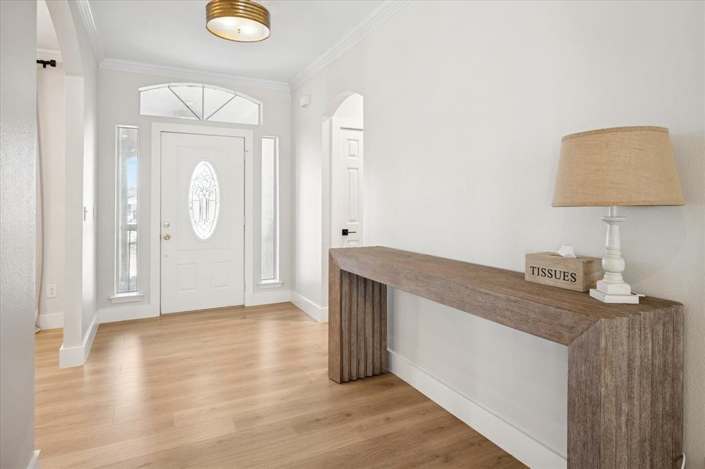 437 South 1st Street Krum, TX 76249 - Photo 7 of 38 a view of livingroom with furniture and wooden floor