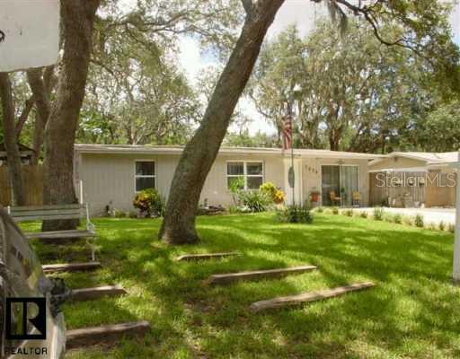 7434 Cedar Point Drive New Port Richey, FL 34653 - Photo 1 of 1 Exterior Front - front of home