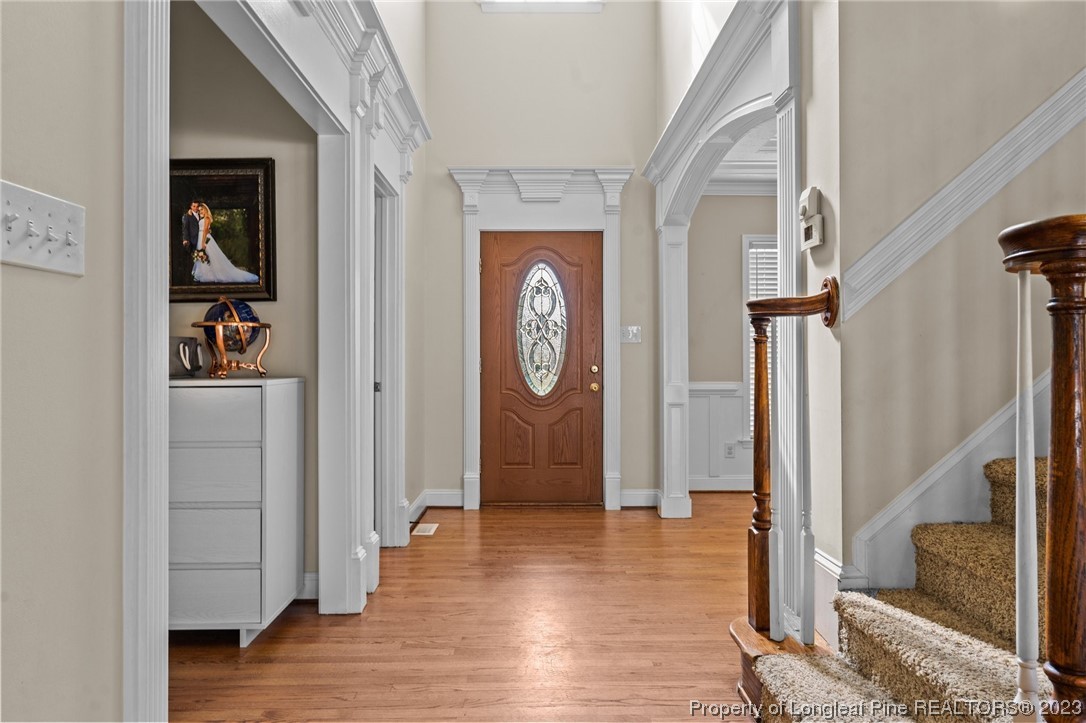 6407 Cattesmore Road Fayetteville, NC 28311 - Photo 12 of 42 a view of an entryway with wooden floor