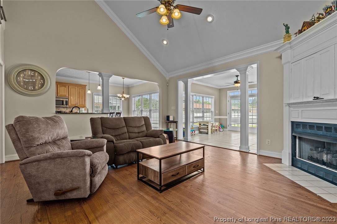 6407 Cattesmore Road Fayetteville, NC 28311 - Photo 13 of 42 a living room with furniture and a fireplace