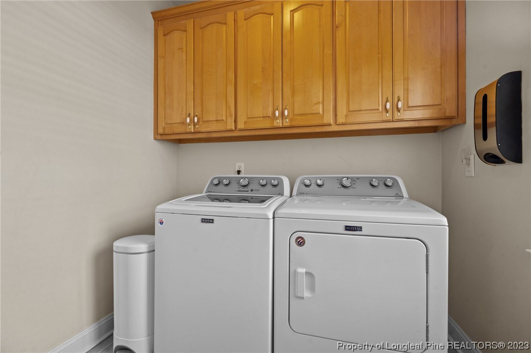 6407 Cattesmore Road Fayetteville, NC 28311 - Photo 25 of 42 a utility room with dryer and washer