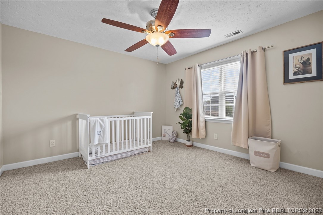 6407 Cattesmore Road Fayetteville, NC 28311 - Photo 26 of 42 a view of an empty room with a window