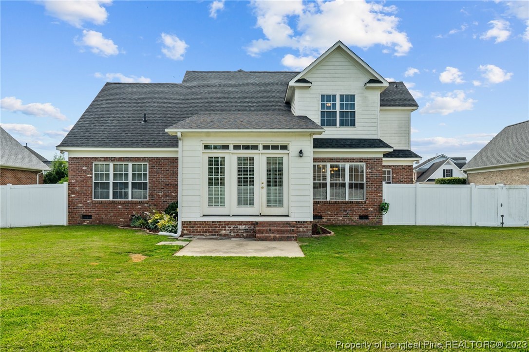 6407 Cattesmore Road Fayetteville, NC 28311 - Photo 38 of 42 a view of a house with a yard and pathway
