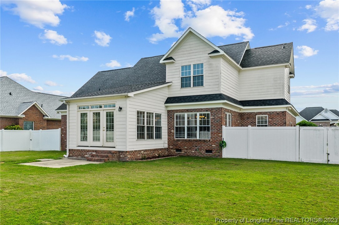 6407 Cattesmore Road Fayetteville, NC 28311 - Photo 39 of 42 a front view of a house with a yard