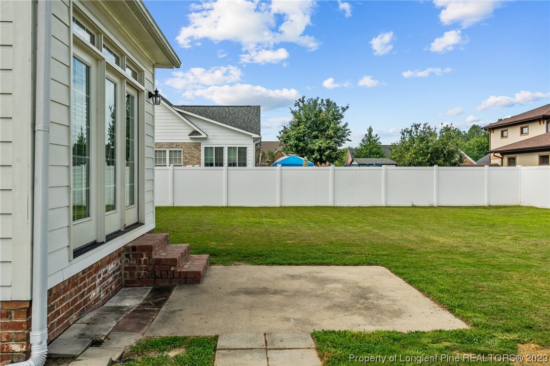 6407 Cattesmore Road Fayetteville, NC 28311 - Photo 41 of 42 a view of backyard with green space